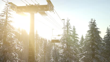 empty-ski-lift.-chairlift-silhouette-on-high-mountain
